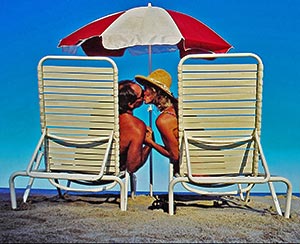 couple-chairs-umbella-beach-598068